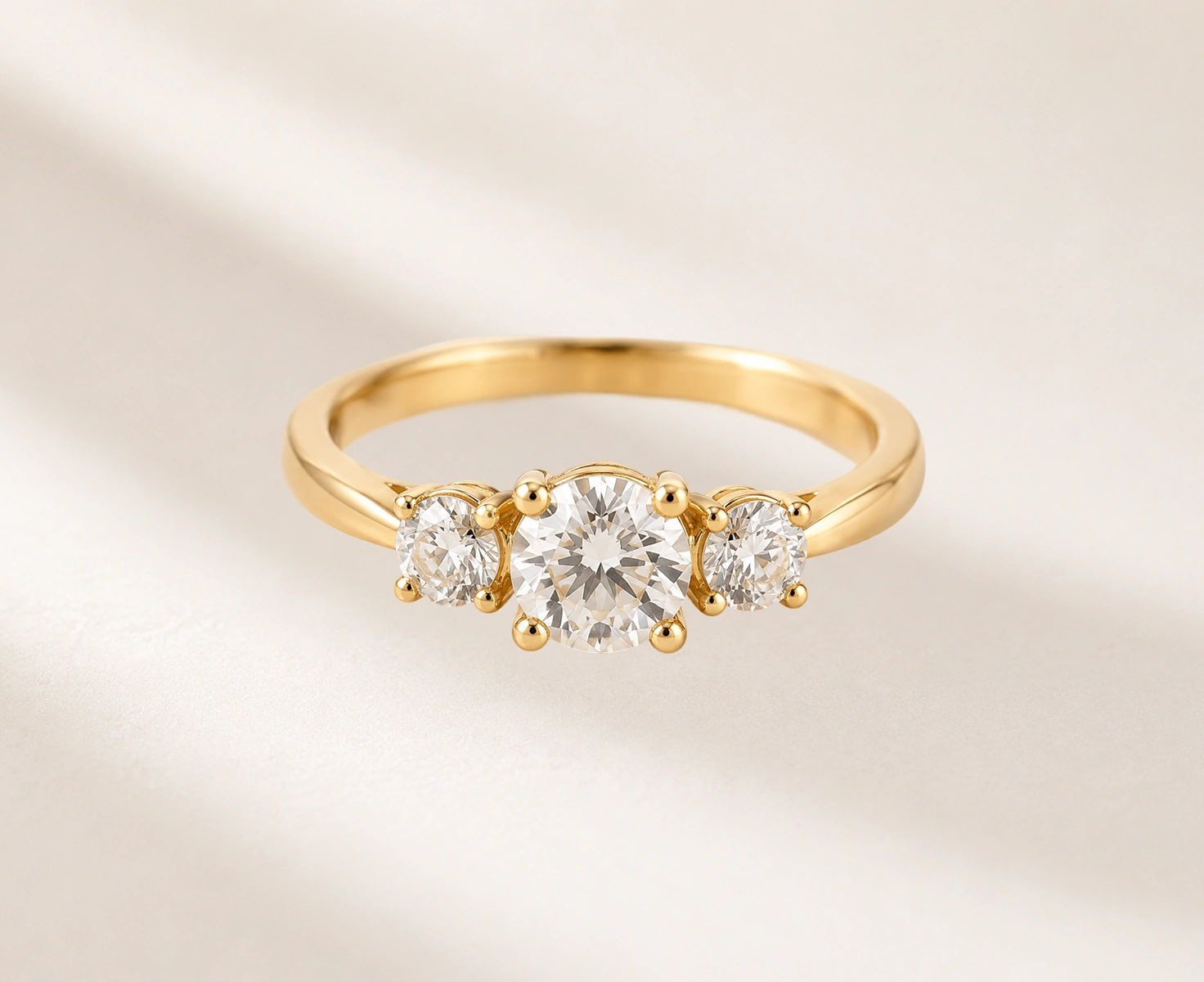 3 Stone Engagement Ring with Round Centre Diamond
