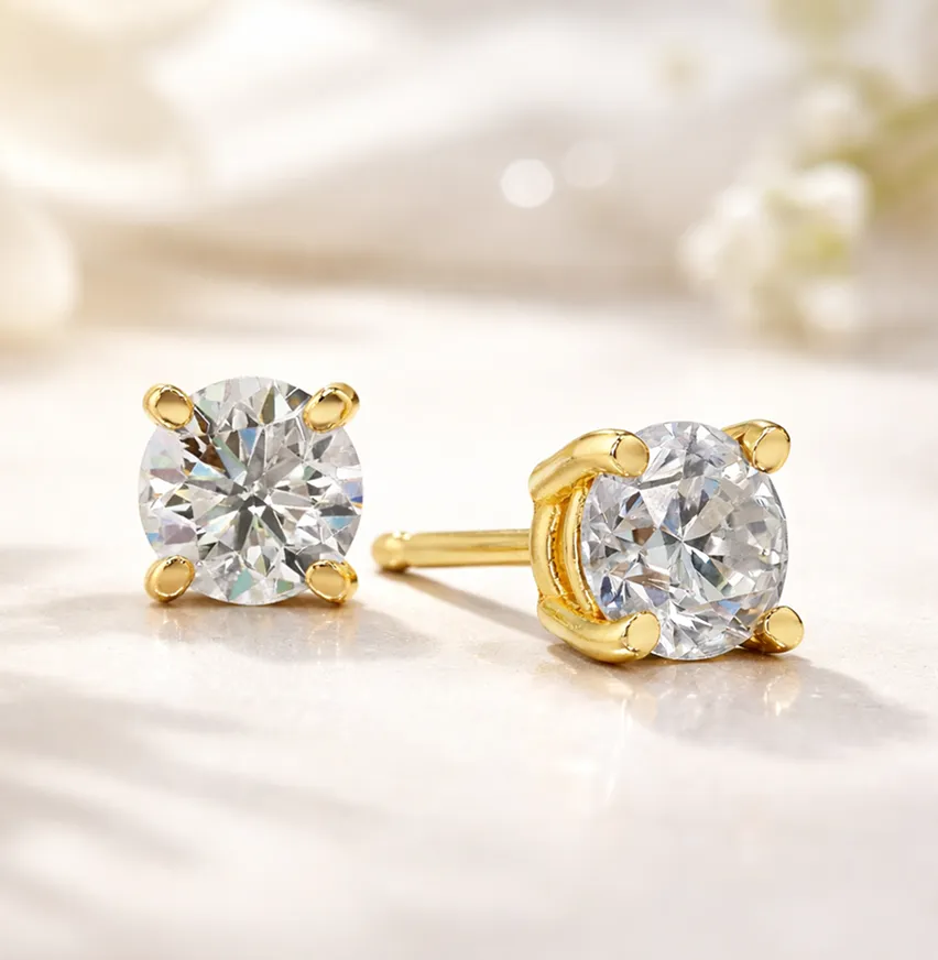 4 prong Yellow Gold studs